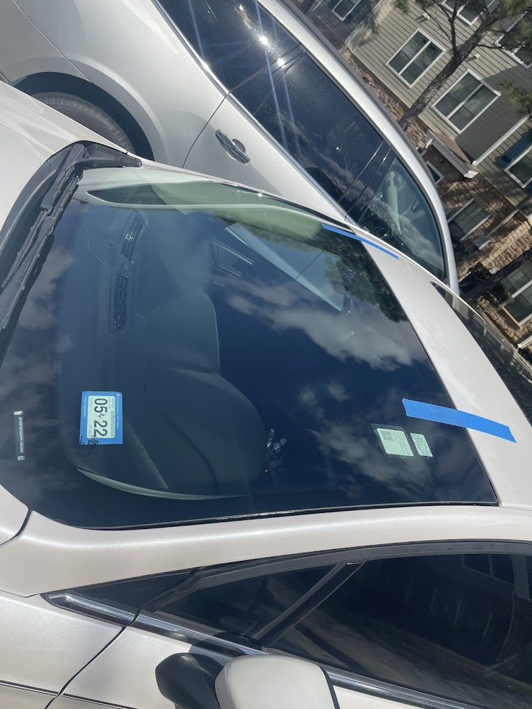 Freshly installed windshield, curing